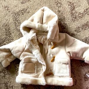 Faux suede coat with faux fur lining and toggle buttons